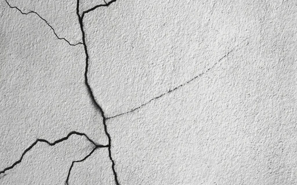 Leads-slipping-through-cracks A cracked wall, representing leads slipping through the cracks